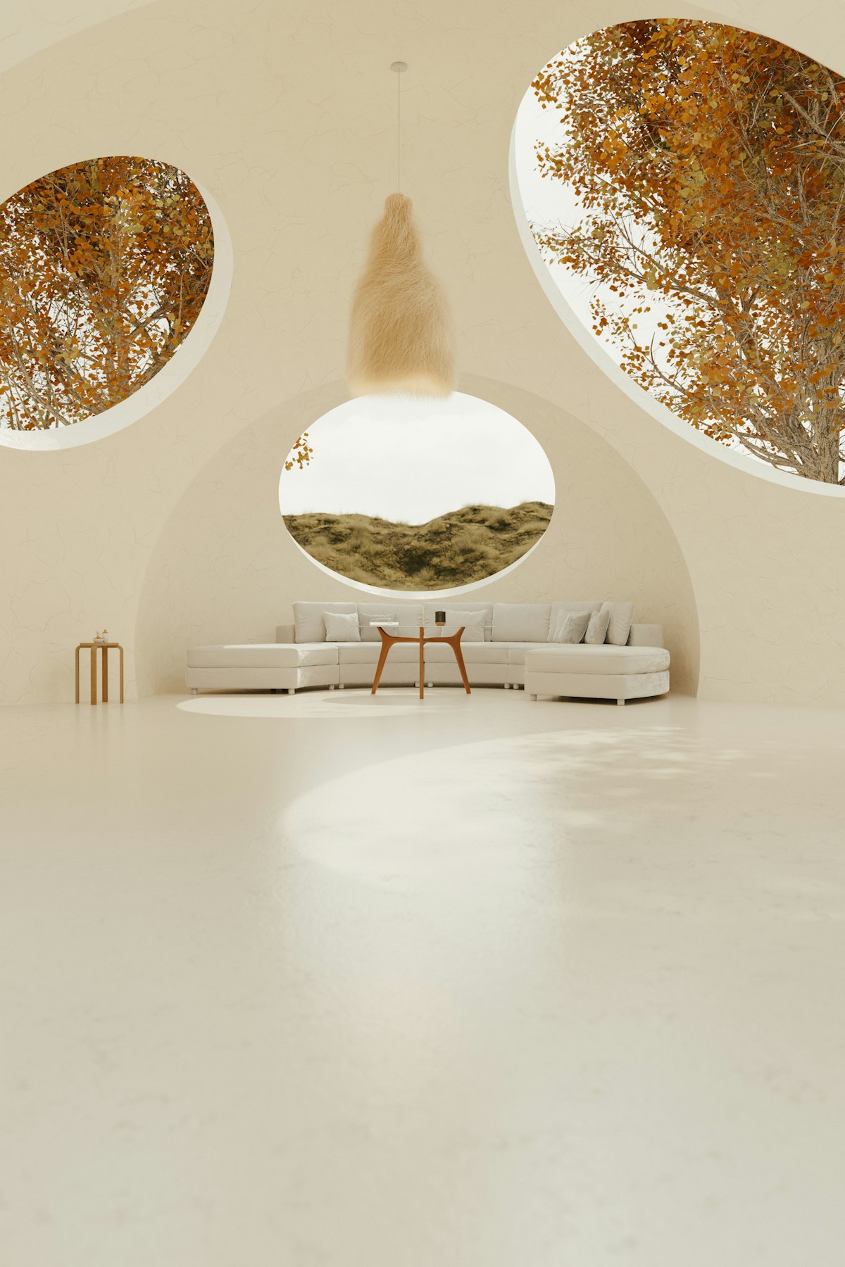 An interior with sculpted circular openings revealing landscape